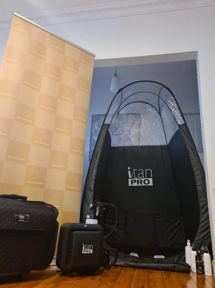 Professional mobile spray tanning setup including an iTan Pro spray tan tent, spray machine and equipment used by Bronzed By Sabrina in Sydney.